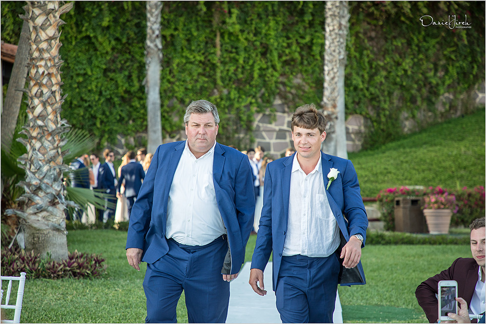 Groom and father walk down the aisle in Los Cabos